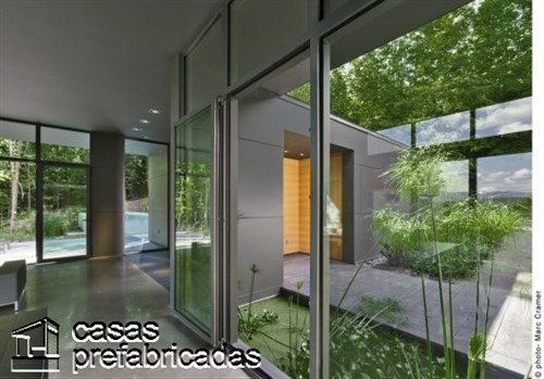 300 m2 T- House en Canadá por Natalie Dionne Architecture (7)